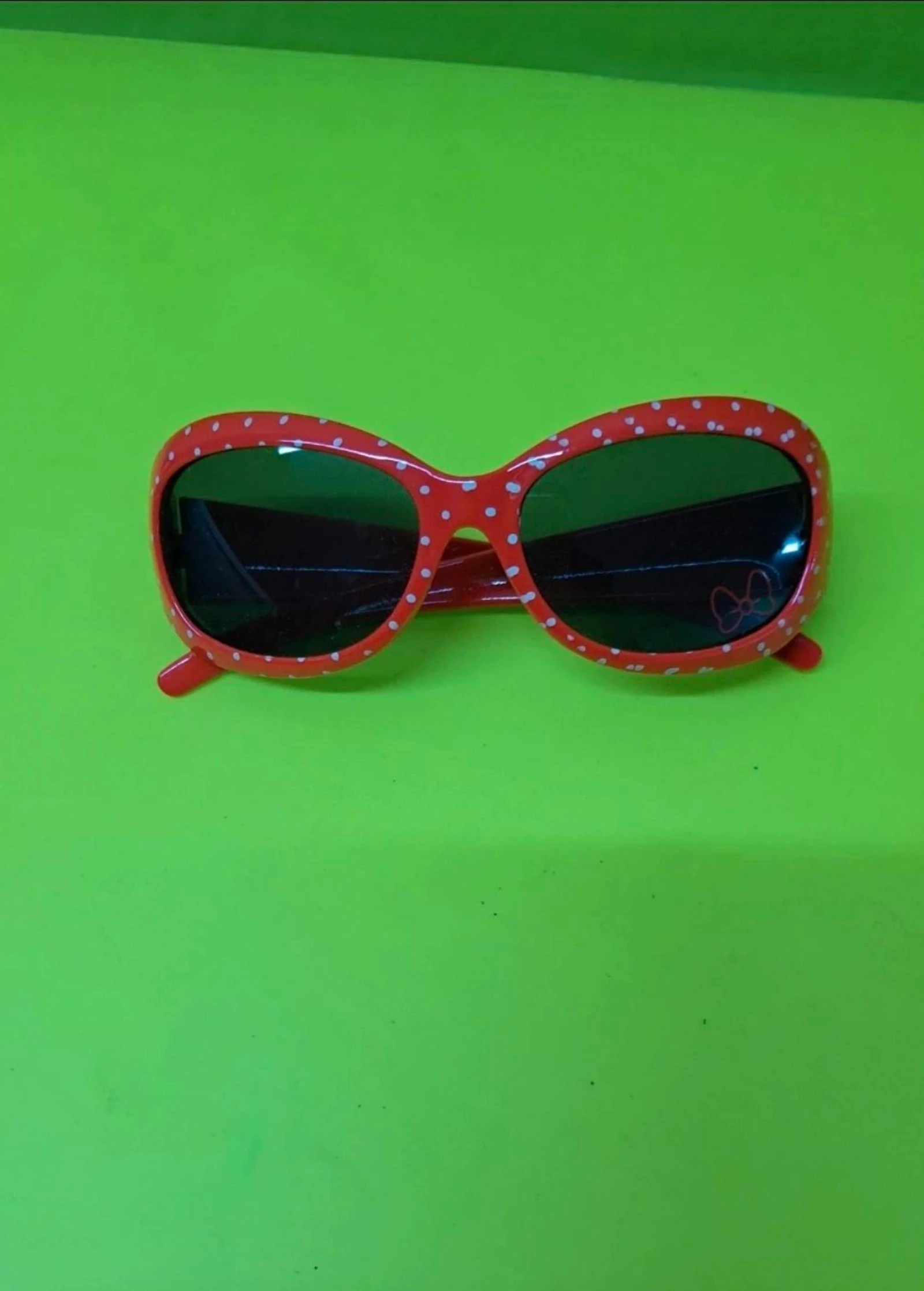Óculos vermelhos Minnie.